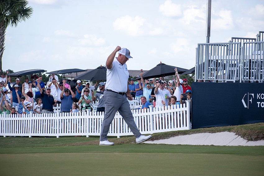 Scott Gutschewski pumps his first after sinking a birdie putt on the Suncoast Classic's first playoff hole.