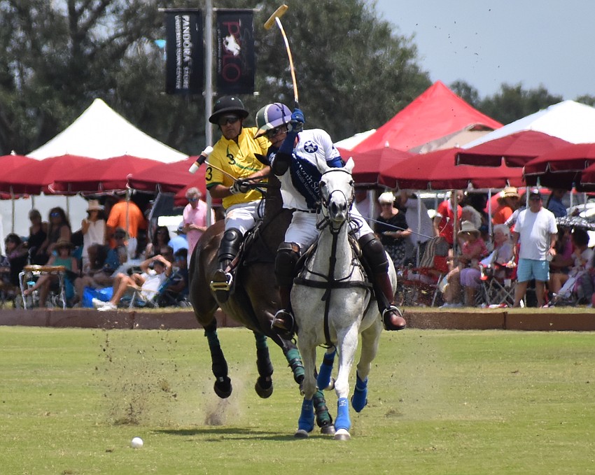 Stuart Campbell of North South Wealth Management/Avalon Farms launches a shot in front of Devin Vass of Whiskey Pond/Columbus Realty.