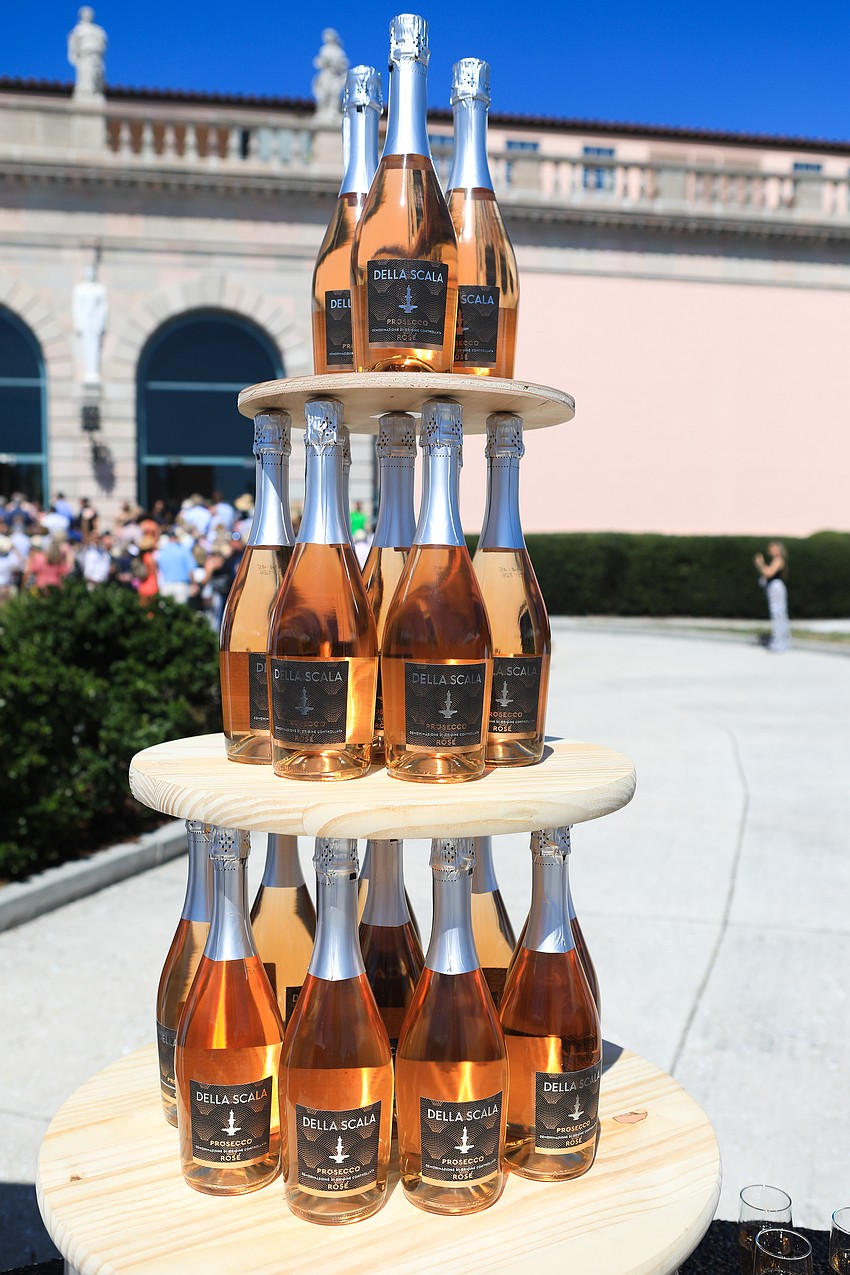 Guests pick up champagne at entry.