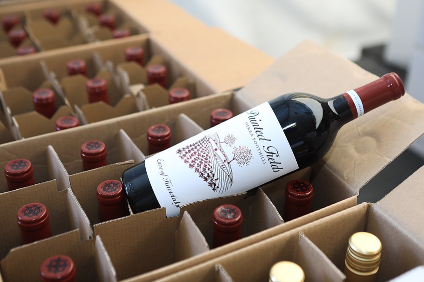 Guests bought all sorts of wine before entering the museum.