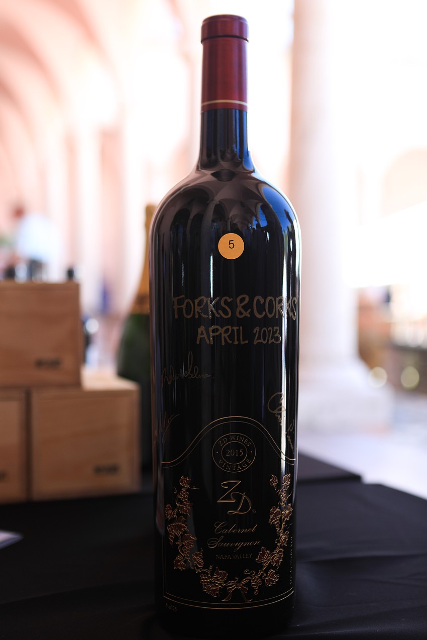 Guests picked up all sorts of wine at the entrance.