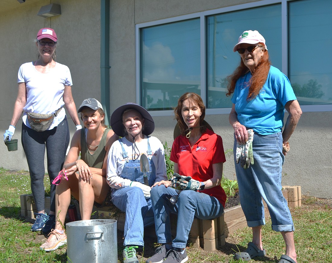 Volunteers Judiann Rakes, DAR Conservation Chair Cory Trustu, Gale Shaw of the Sugar Mill DAR chapter, Nancy Roddy and Susan Barry. Courtesy photo