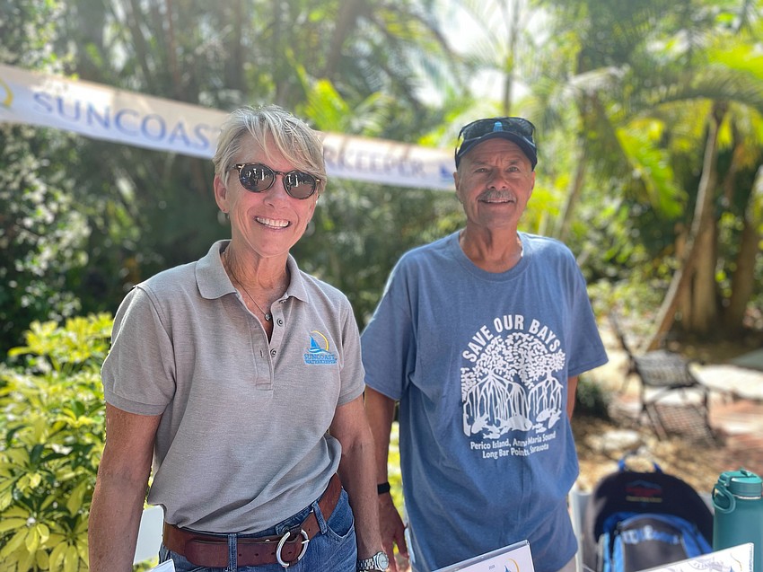 Alison Albee and Richard Moore, board members, explain the mission of Suncoast Waterkeeper is to protect and restore Florida's sun coast waters for the benefit of all.