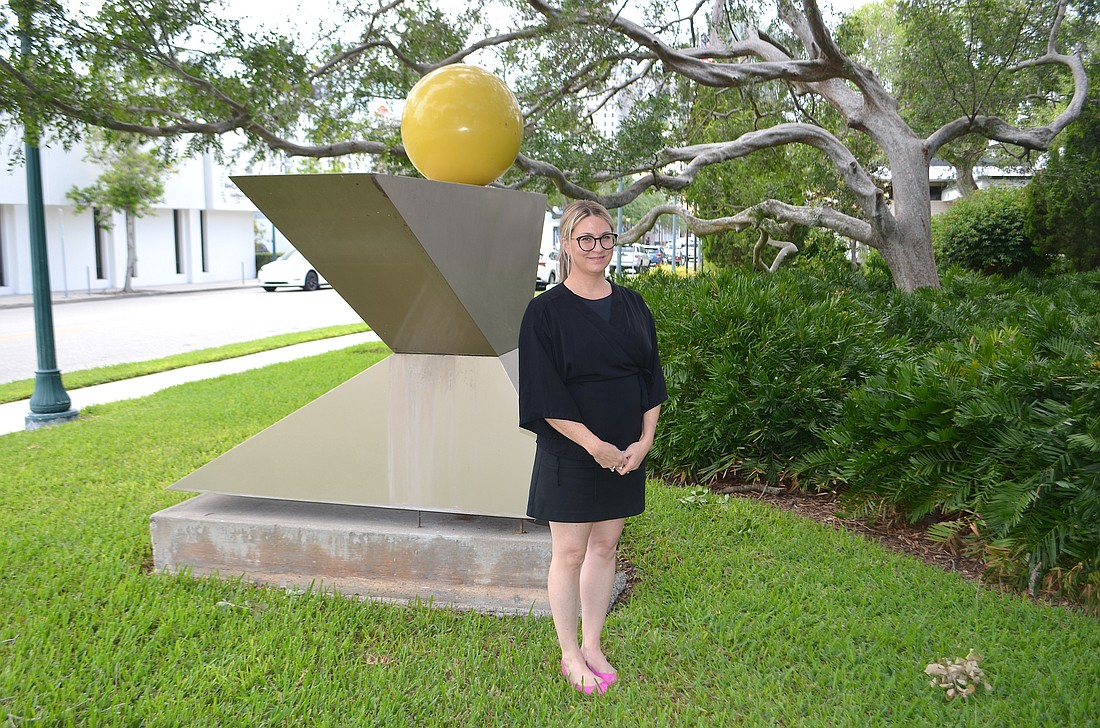 Mary Davis Wallace, who is the lead for the Sarasota Public Art Plan, at Garden Sculpture on the lawn at city hall.