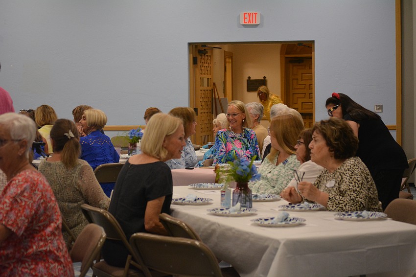 Members of the Star of the Sea Women's Guild mingle at the luncheon.