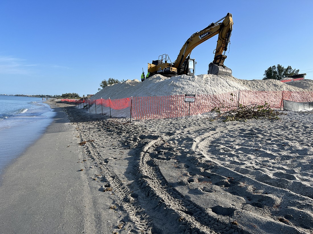 Earth-moving equipment is on site at Turtle Beach as more than 92,000 cubic yards of sand will be delivered to make repairs to the storm-damaged beach.