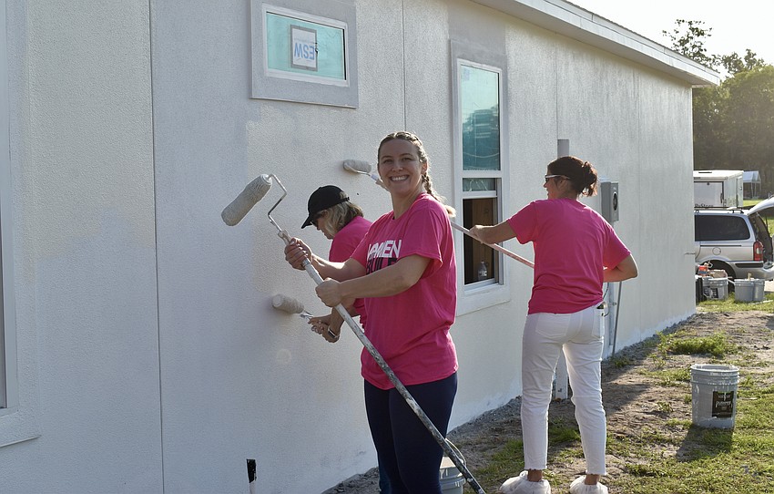 Callie Friedman stops for a photo and to tighten her roller.