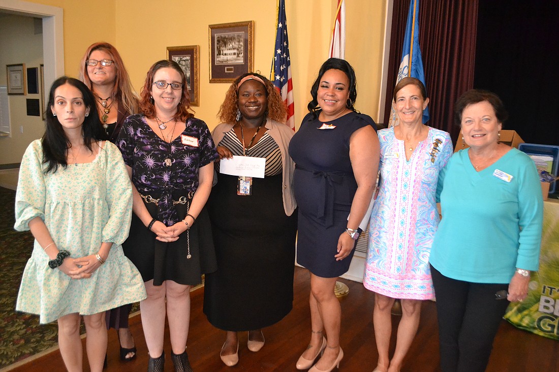 Scholarship recipients Sabrina Kushelman, Jessica "Kirby" Boatman and Amber Rohrer, Falcon HOPE Center Director Rabecka Collins, scholarship recipient Katie Bonds, DAR Chapter Regent Cathy Greenblum and Scholarship Chair Marilyn Meeske. Courtesy photo