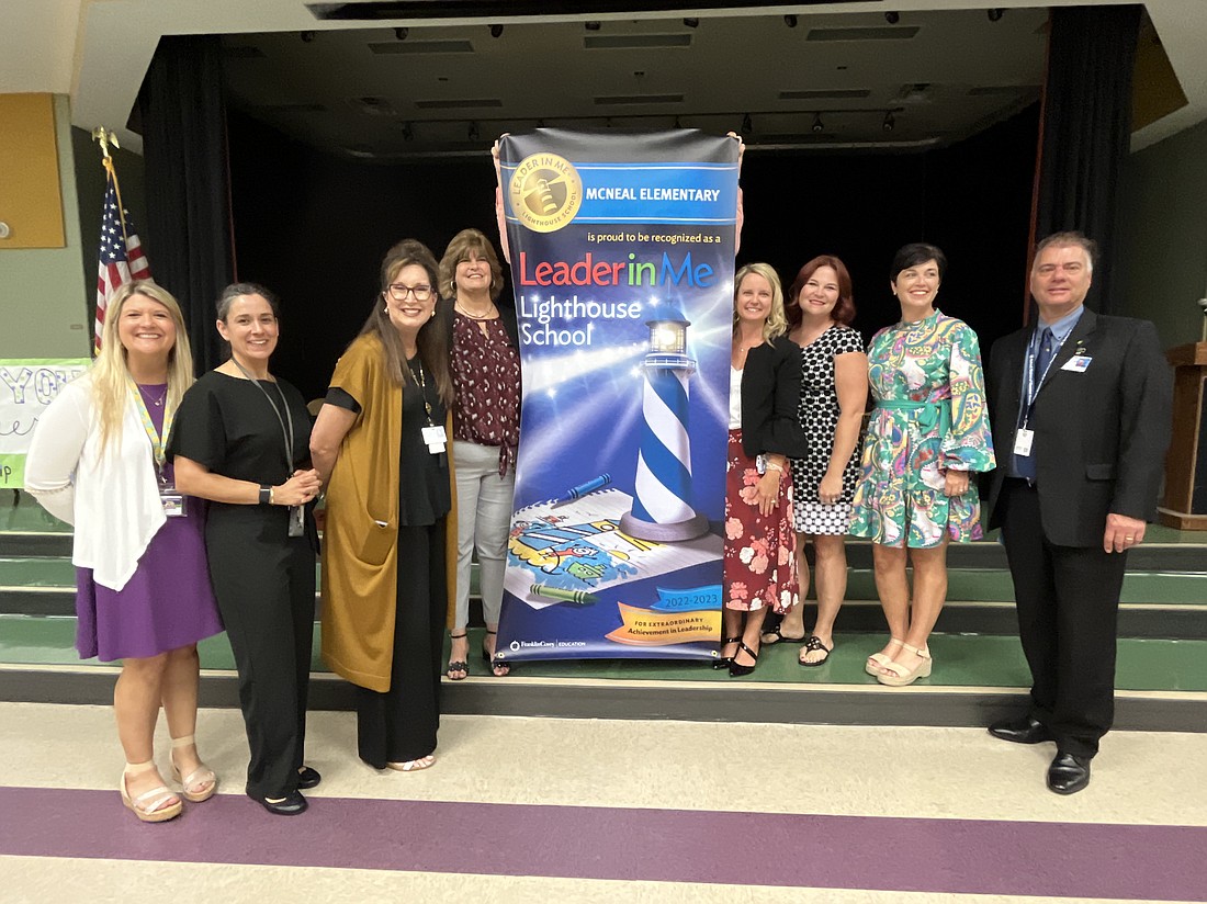 Gilbert W. McNeal Elementary School staff, School District of Manatee County officials and Leader in Me representatives celebrate McNeal Elementary becoming a Leader in Me Lighthouse School.