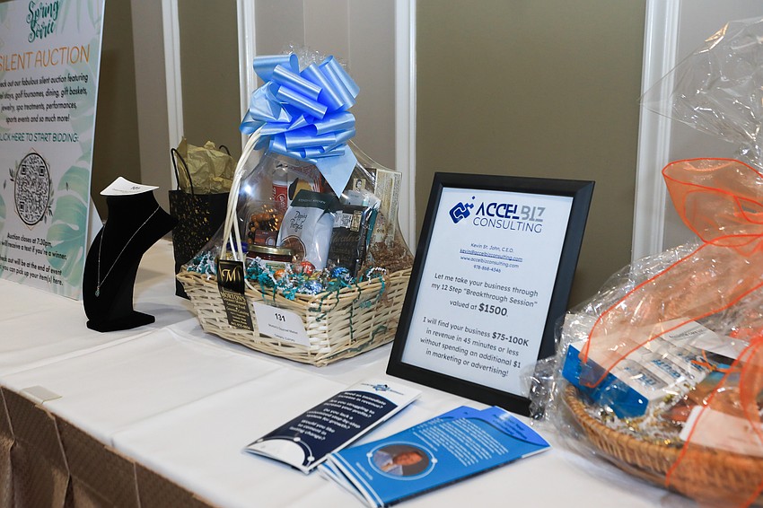 Guests bid on silent auction items.