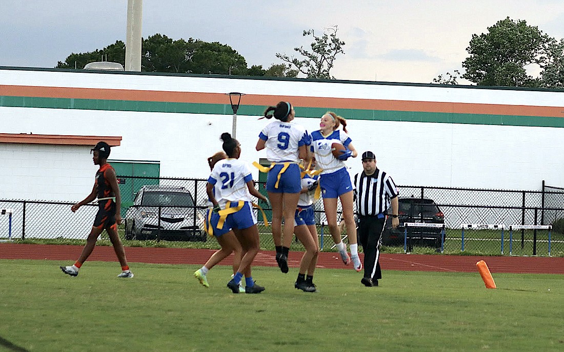 Mainland celebrates a touchdown in its 13-6 flag football victory over Orlando Jones in the regional quarterfinals. Courtesy photo by Kim Stoner.