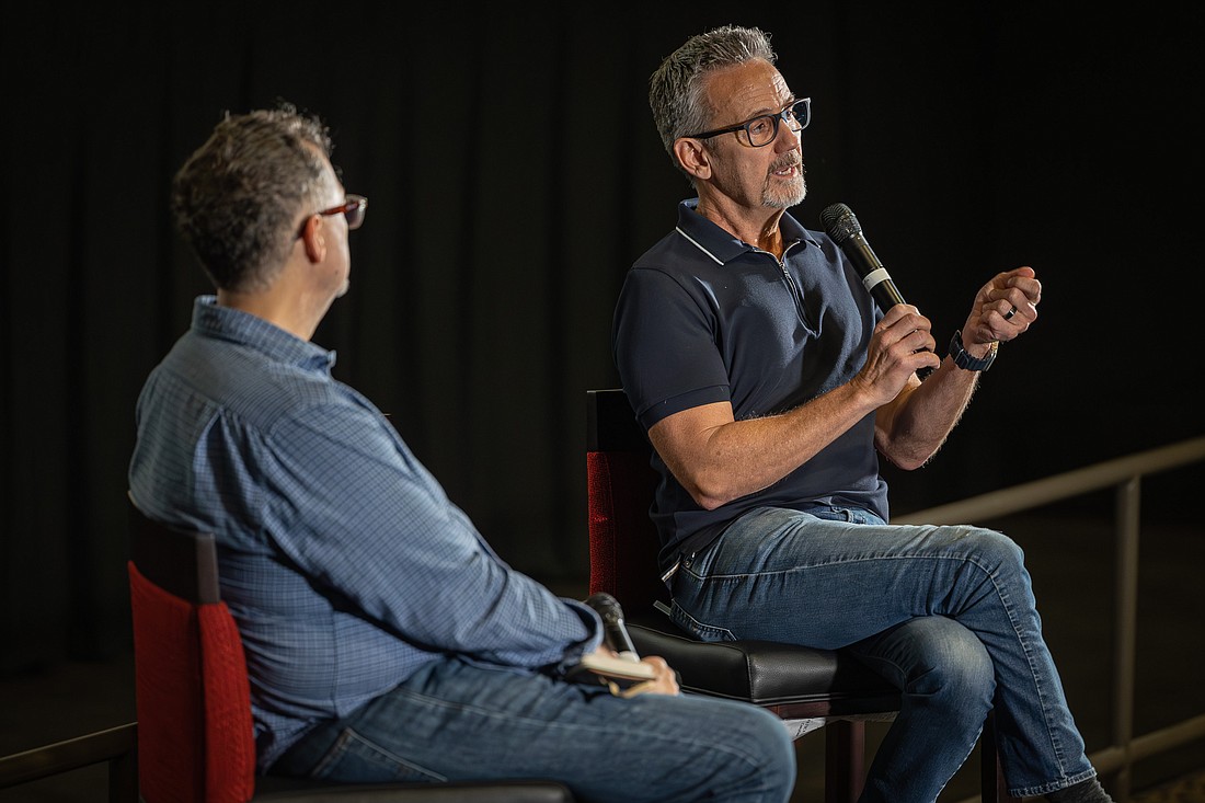 Mitchell Bell, Marvel Studios VP (right), spent an hour and a half answering questions from a crowd of film industry professionals. Also pictured is moderator Dave DeBorde.