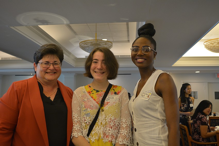 Katherine Martin, mother, Kalie Martin, winner of ABC Books special award, and Kashante Mays, teacher