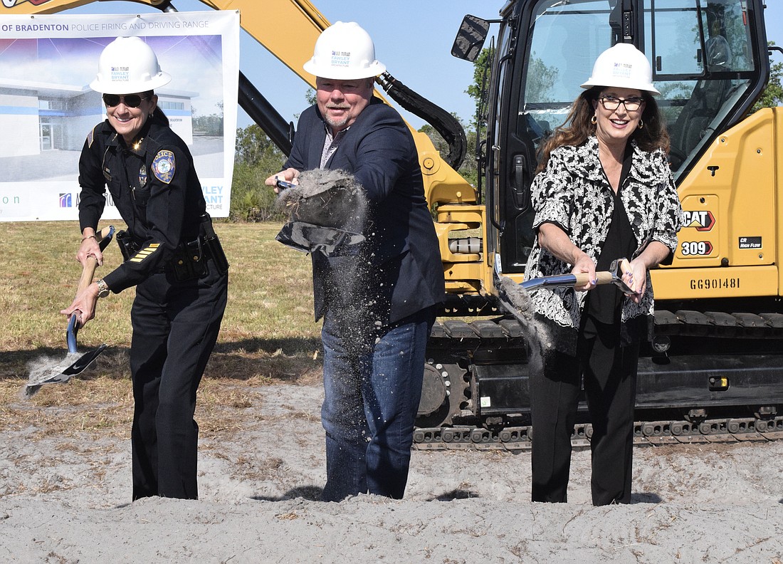 Bradenton Police Chief Melanie Bevan, Bradenton Mayor Gene Brown and Cynthia Saunders, the superintendent of the School District of Manatee County, celebrate the groundbreaking of the new firing and driving range.