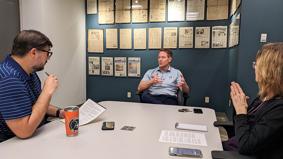 Jacksonville mayoral candidate Daniel Davis meets with Jacksonville Daily Record Associate Editor Mike Mendenhall and Editor Karen Brune Mathis on May 3 at the publication's Downtown offices.