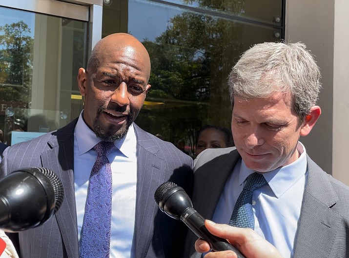 Former Democratic nominee Andrew Gillum (left) and attorney David Markus spoke after a jury acquitted Gillum on one charge and couldn't reach a verdict on other charges.
Photo by Dara Kam, The News Service of Florida
