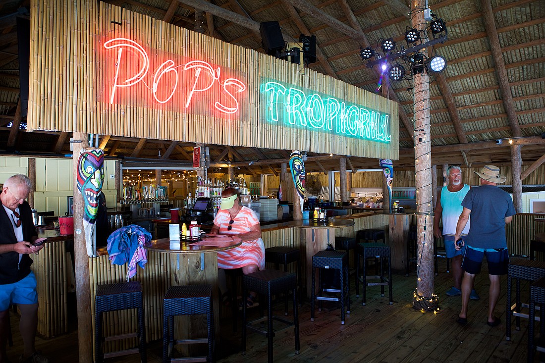 Pop’s Sunset Grill is on the Intercoastal Waterway across from Casey Key.