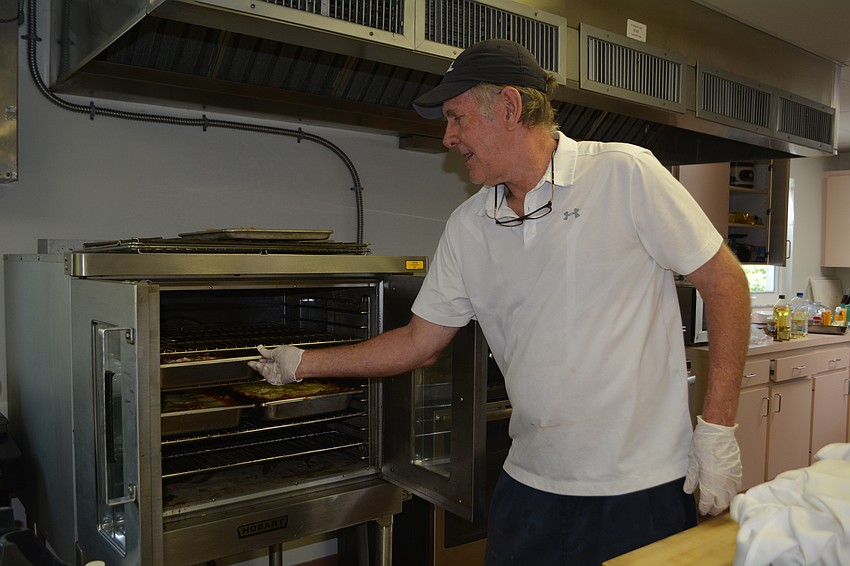 Chef David Stone checking on the lasagnas.