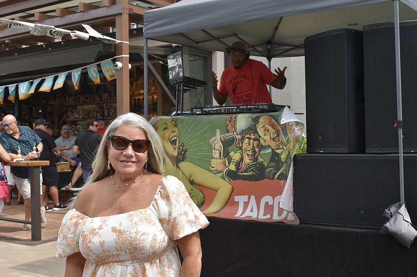Lakewood Ranch's Denise Equinada enjoys music provided by DJ Memphis.