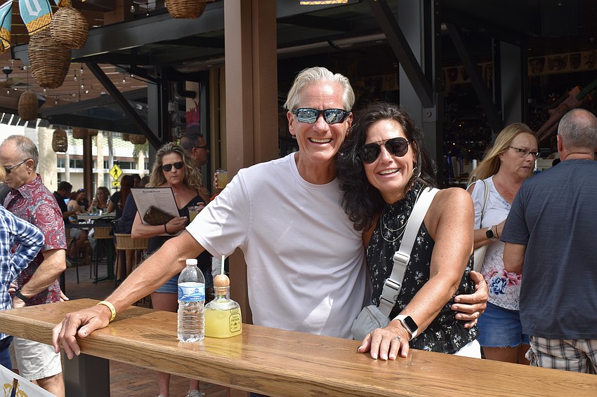 Windward residents Scott and Tracy Woodruff have fun at Rocco's Cinco de Mayo block party.