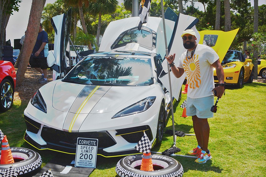 DJ Johnson, from Apollo Beach, stands next to his 2021 C8 Corvette