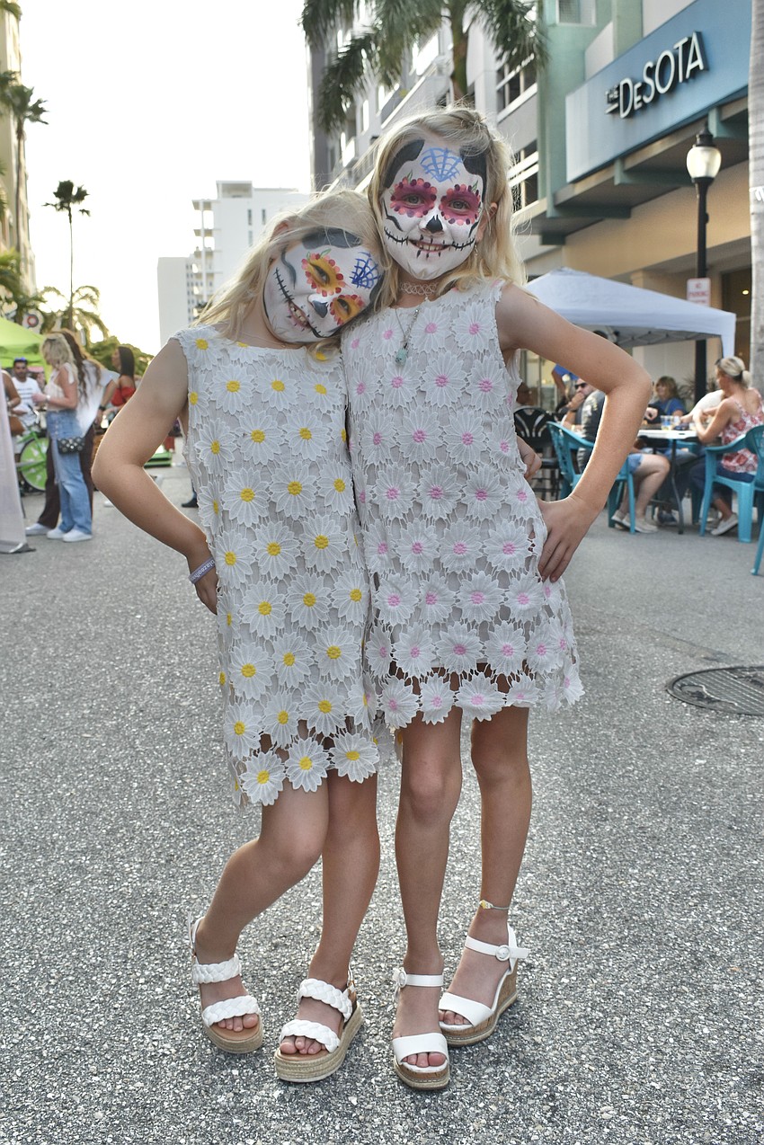 7-year-old Olivia Dendy and 9-year-old Grace Dendy at the Circo event