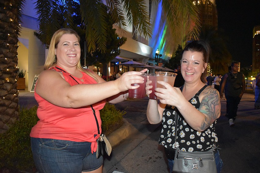 Kristin Love and Amanda Salois fetch some drinks at the Fresh Fridays event