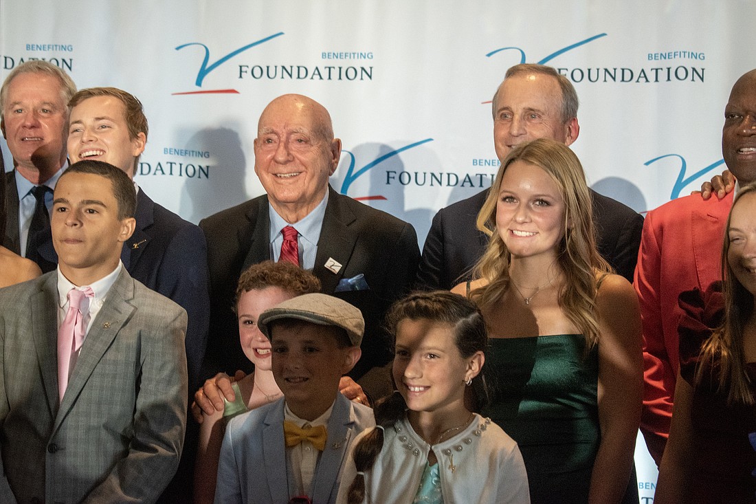 Dick Vitale stands with members of his All-Courageous team and the gala's 2023 honorees.