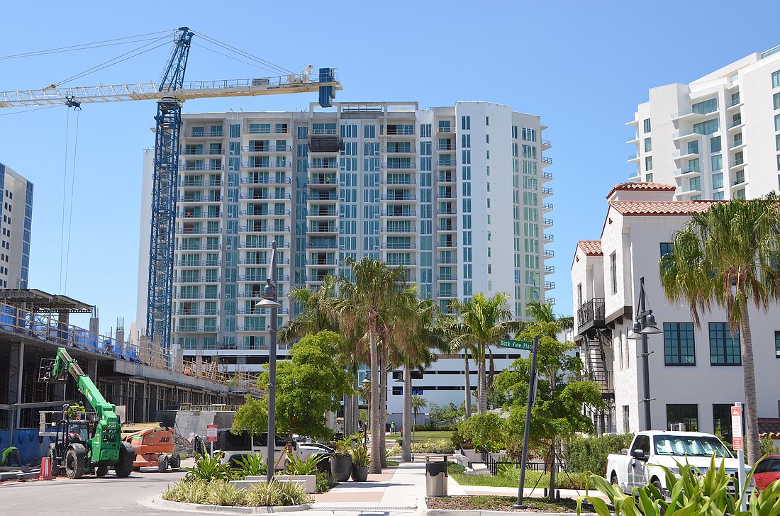 Luxury condominium tower Bayso nears completion at The Quay in Sarasota.