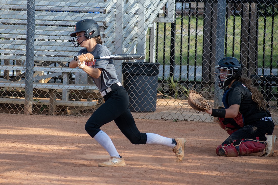 Sailors senior Addisyn Schwied singles up the middle during a scrimmage.