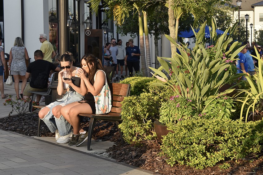Lakewood Ranch residents Melanie Meegan and Juliet Celine sip on a Fruity AF Margarita and a rum punch.