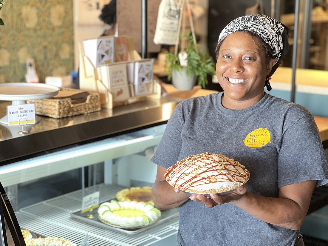 Mixed Fillings Pie Shop owner Natasha Burton and one of her creations.