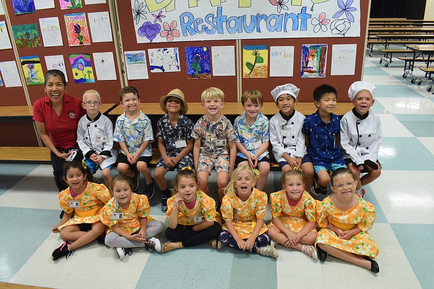 Tara Elementary School's Josephine Johnson's kindergarten class is ready to be chefs, waiters, cashiers and greeters for the Banana Leaf Restaurant.