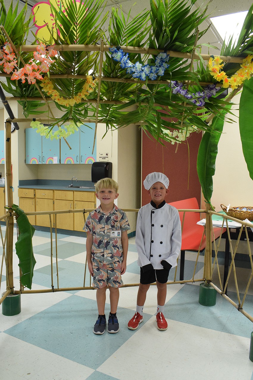 Kindergartners Brantley Emmons and Cameron Cunnien are excited to be a part of the Banana Leaf Restaurant.