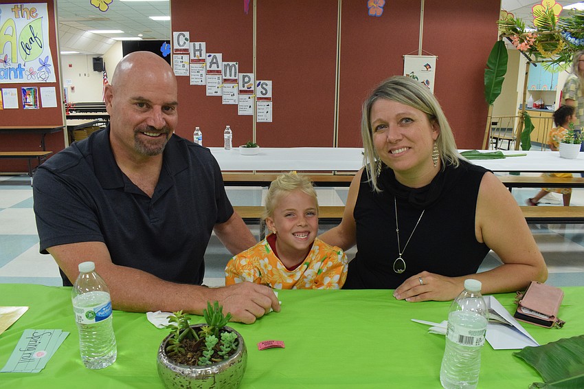 Dave Withrow, Allie Rose Withrow and Samara Williamson enjoy the Banana Leaf Restaurant. Allie Rose Withrow is a server at the restaurant.