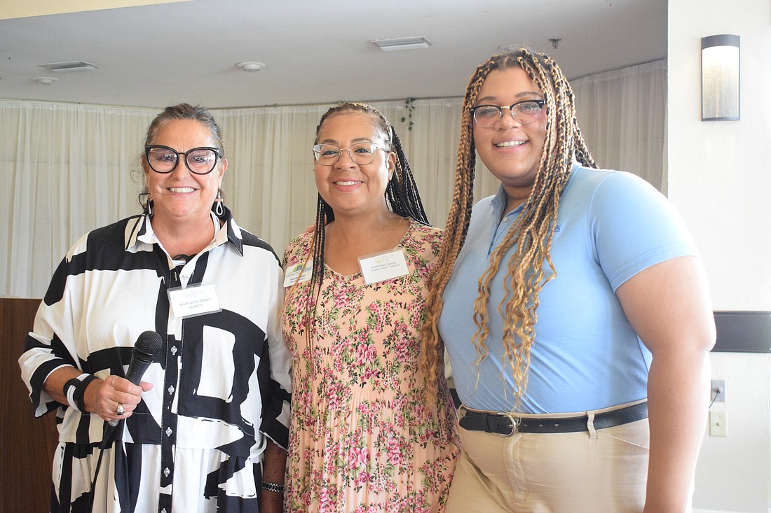 Mary Beth Rempp, a member of the Palm Aire Women's Club, says the grant the women's club gave to Valerie Green and Erline Constant with the Healthy Teens Coalition of Manatee County will go toward recruiting and training more health counselors.