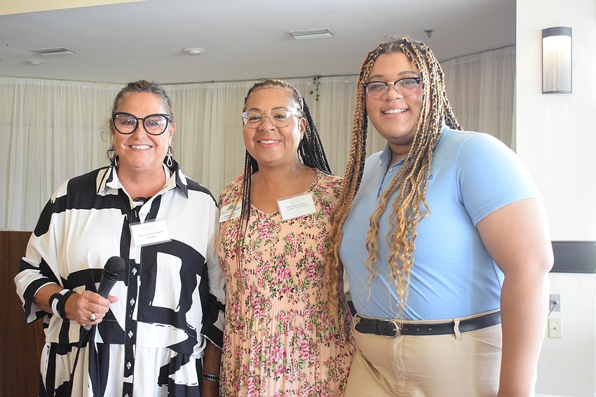 Mary Beth Rempp, a member of the Palm Aire Women's Club, says the grant the women's club gave to Valerie Green and Erline Constant with the Healthy Teens Coalition of Manatee County will go toward recruiting and training more health counselors.