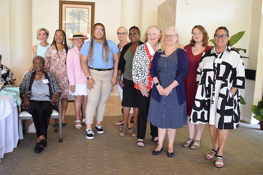 Representatives from six nonprofits in Sarasota and Manatee counties and three members of the Palm Aire Women's Club celebrate the grants the women's club gave the nonprofits.