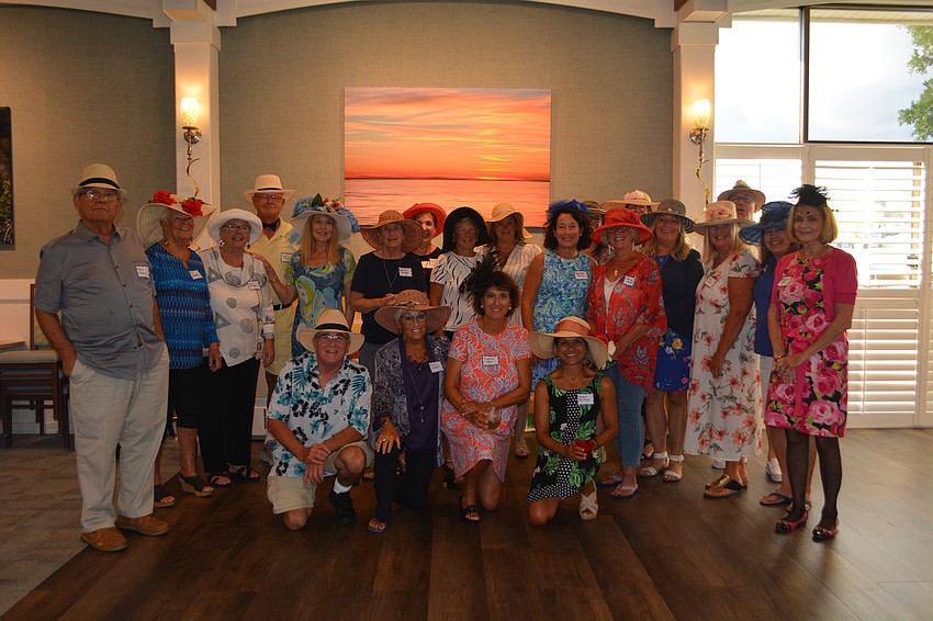 Residents of Longboat Harbour Condominium pose for a photo moments before the race.