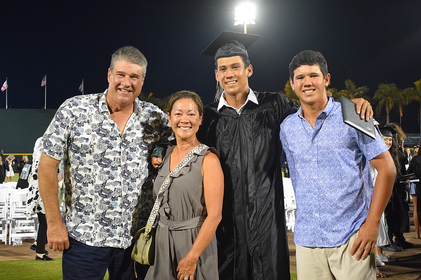 Barry Severs celebrates with his wife, Sandy Severs, and his sons Preston Severs, who graduated from Lakewood Ranch High School, and Parker Severs. 
