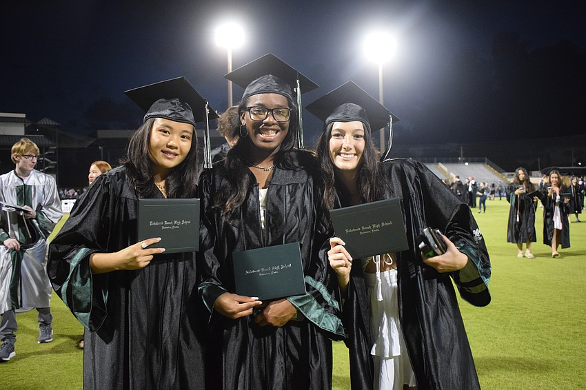 Lakewood Ranch High graduates Mia Hidalgo, Mykelah Davis and Katie Hardesty say it hasn't hit them yet that they have graduated from high school.