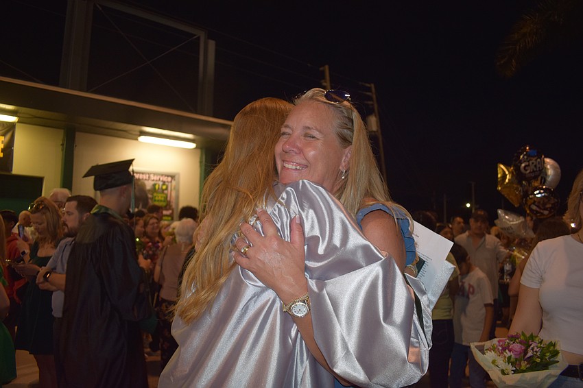 Lakewood Ranch High School graduate Jessica Kobetitsch hugs her mother, Stephanie Kobetitsch. 