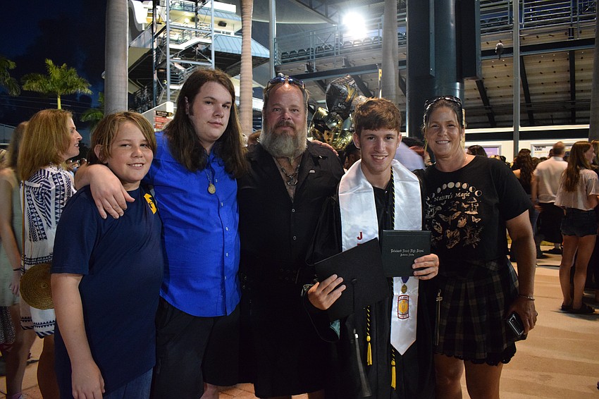 Elijah Blackman, Skyler Blackman, Leo Blackman Sr., Leo Blackman Jr. and Shannon Blackman celebrate Leo Blackman Jr.'s graduation. Leo Blackman Jr. is enlisting in the Army.