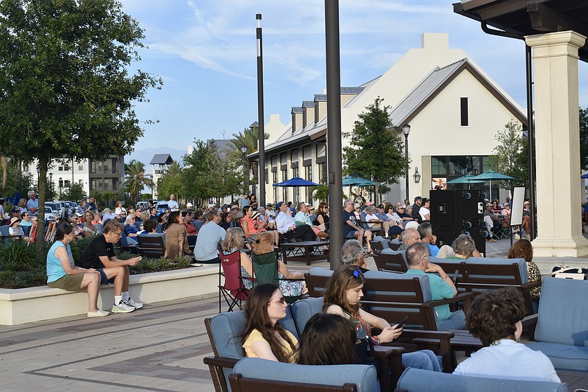 Area residents fill the Waterside Place plaza for Sights and Sounds on Thursday night.