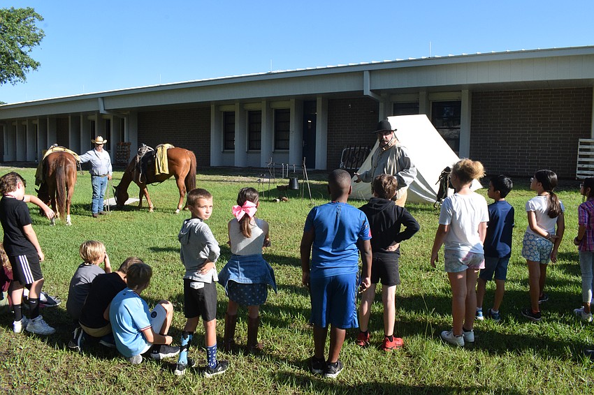Gene Witt Elementary School students learn about life in the 1900s.