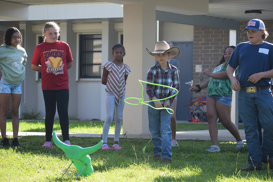 Wesley Hoben, a Gene Witt Elementary School fourth grader, practices with a lasso.