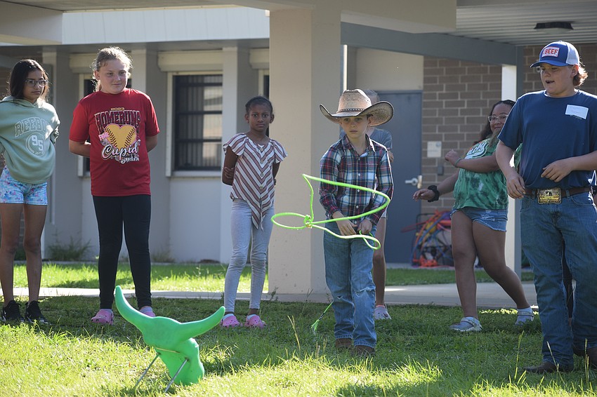 Wesley Hoben, a Gene Witt Elementary School fourth grader, practices with a lasso.