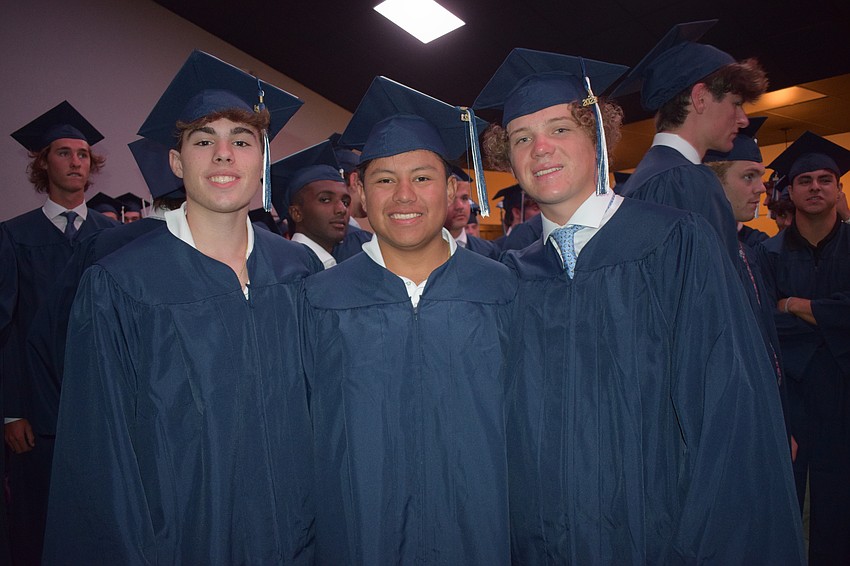 Out-of-Door Academy's Drew Hill, Arlo Hanes and Will Becker are excited to be at graduation. 