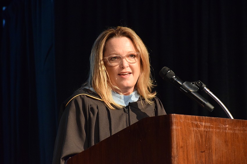 Deb Otey, the Out-of-Door Academy's head of school, encourages graduates to find three things in life: People, purpose and peace.