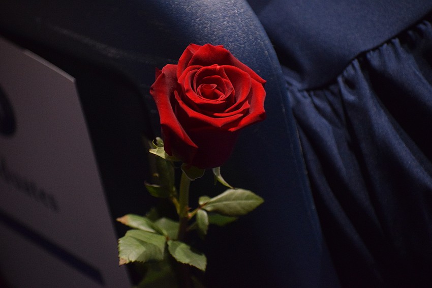 Each Out-of-Door Academy graduate receives a rose.